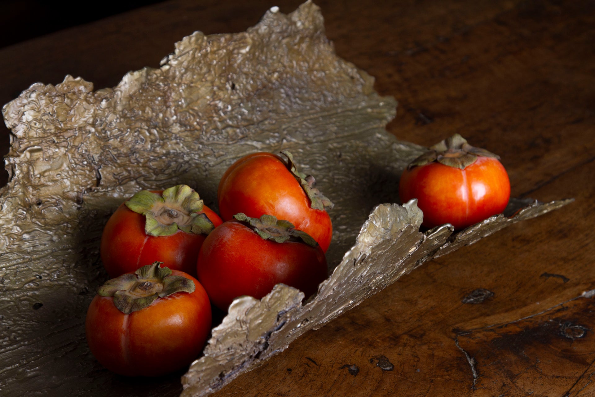 Side angle of the bronze bark bowl, showcasing its unique texture and the natural details of the tree bark it was cast from.