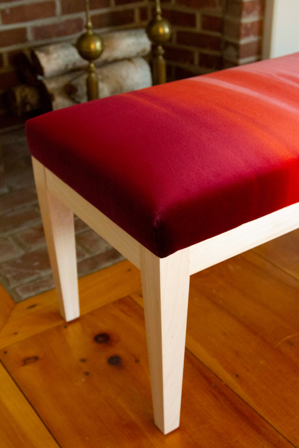 Corner detail on maple bench upholstered in ombre cotton velvet, dimensions 49”W x 16”D x 18”H, customizable design.