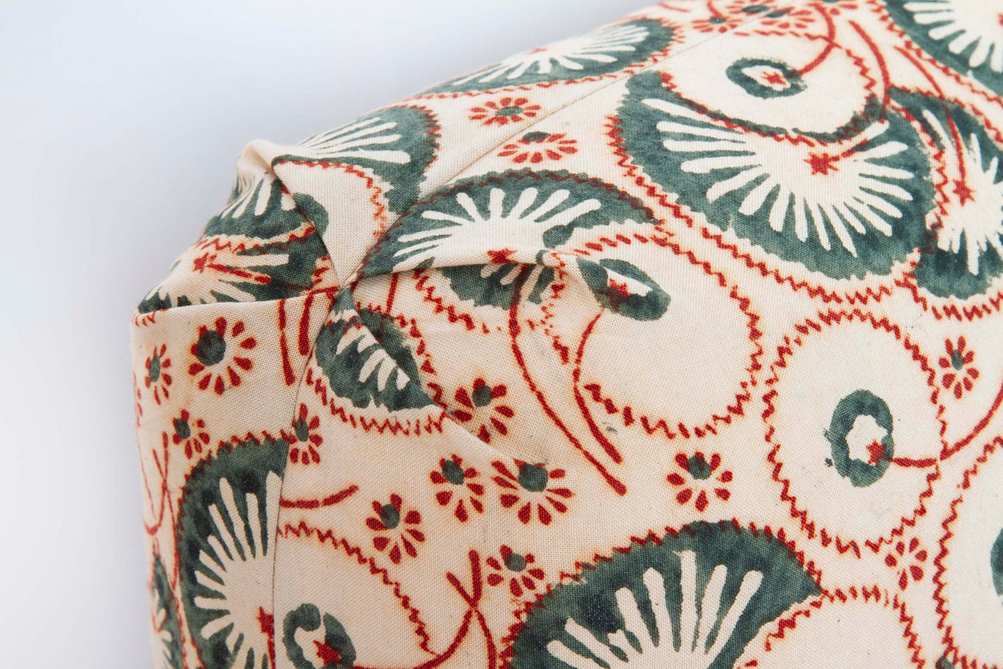 V-pleat Turkish corners on Olive and red Kalamkari block print pillow, 16x20, beige cotton with blind seams.