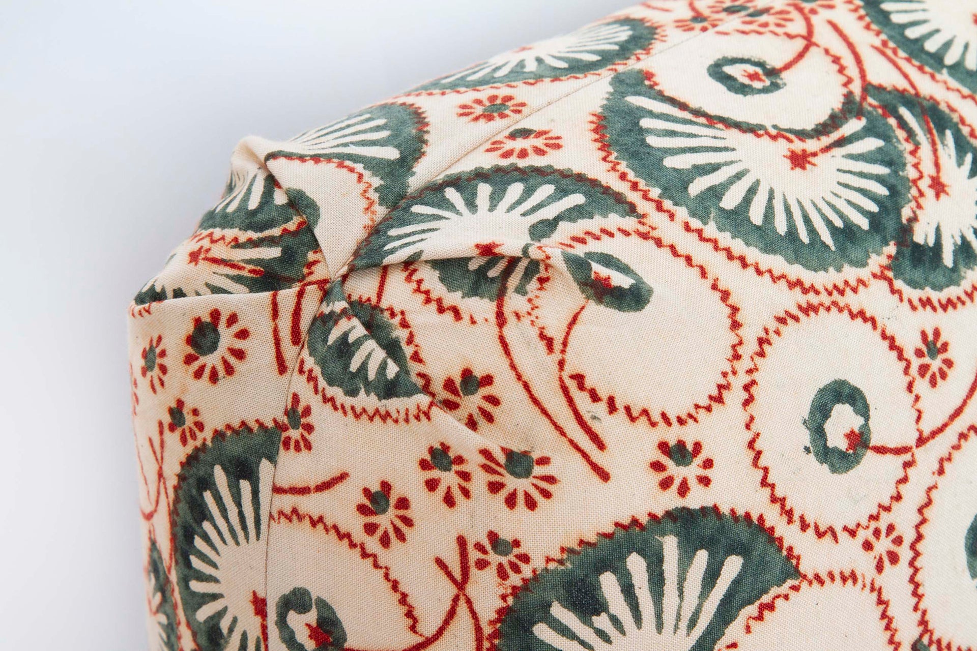 V-pleat Turkish corners on Olive and red Kalamkari block print pillow, 16x20, beige cotton with blind seams.