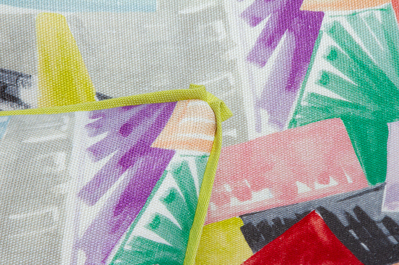 Fabric and corner detail of Clarence House Aimee pillow in hemp and linen with chartreuse flange.