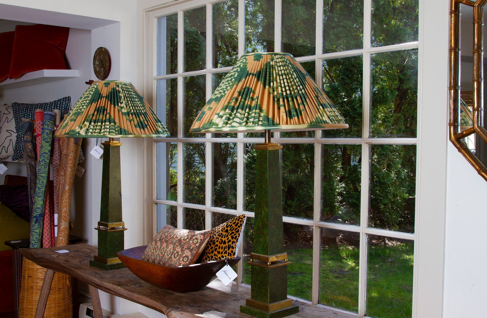 Vintage brass obelisk lamps with faux-marble painted sides, measuring 37” H x 6” W x 6” D in front of a window.