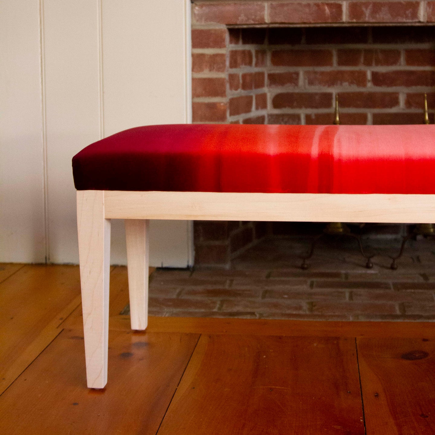 Tapered leg detail on maple bench upholstered in ombre cotton velvet, dimensions 49”W x 16”D x 18”H, customizable design.