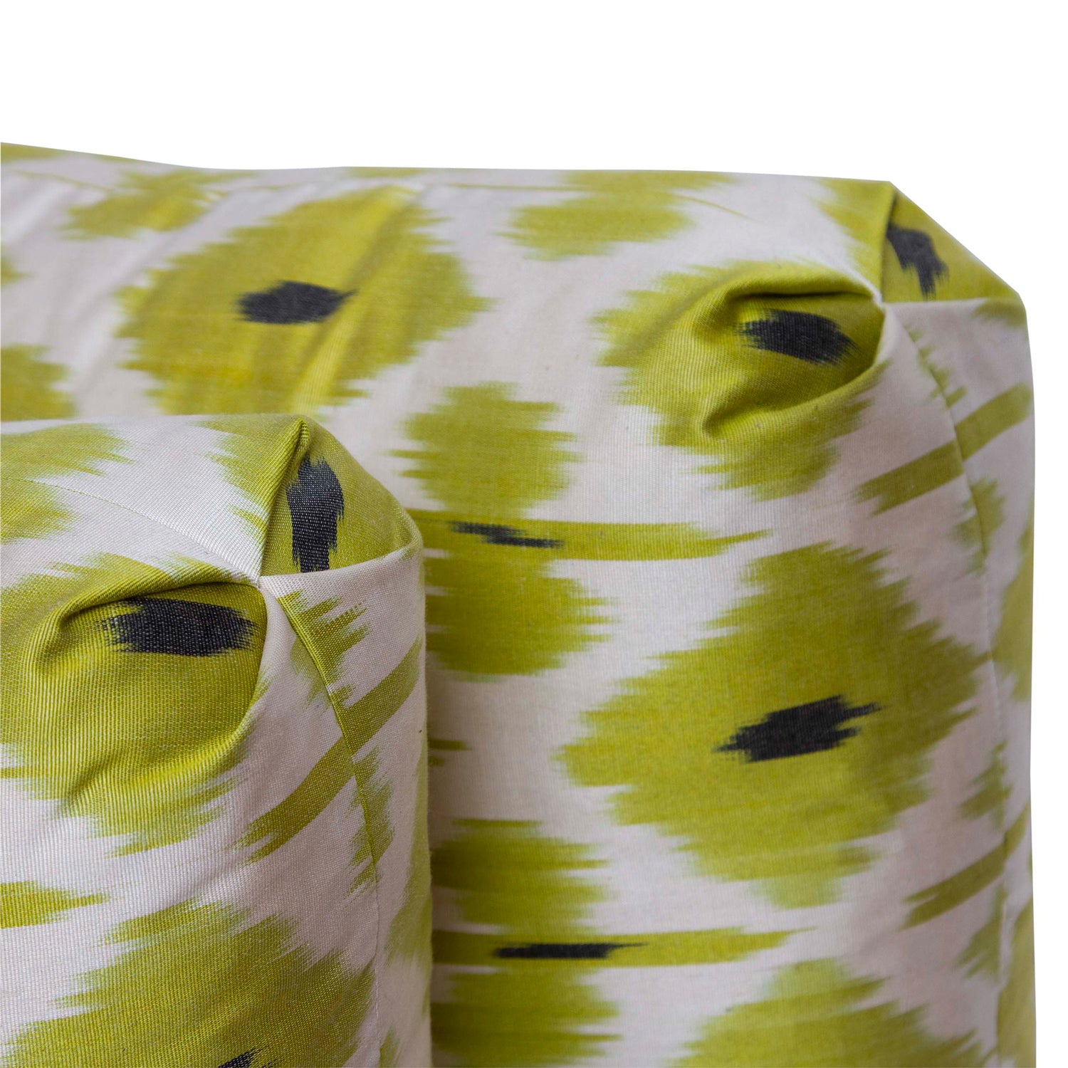 V-pleat Turkish corner detail on handwoven lime silk ikat pillow, 14x18 inches.