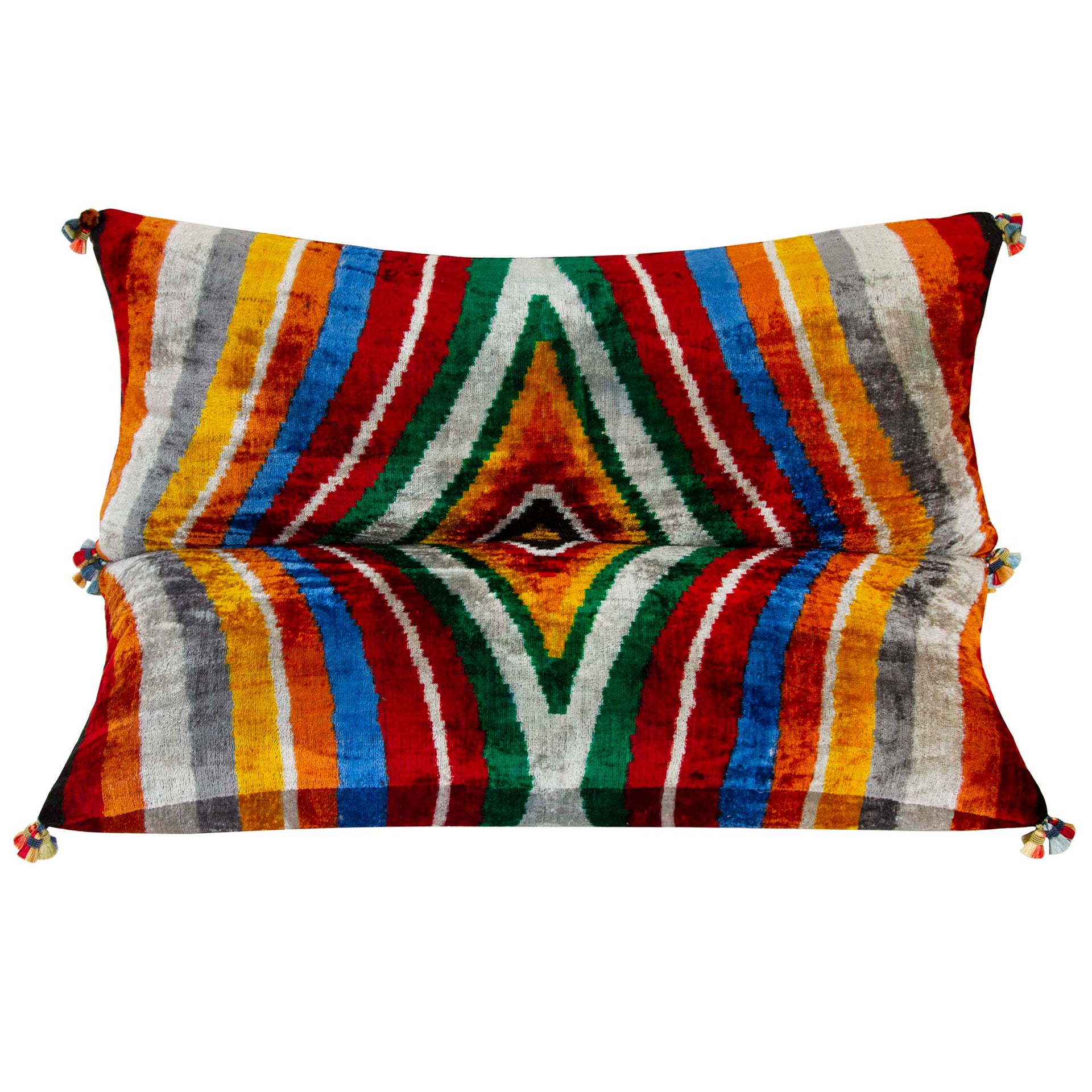 15x34 silk velvet ikat lumbar pillow with multicolored tassels, handwoven in Uzbekistan, perfect for a sofa or bed.