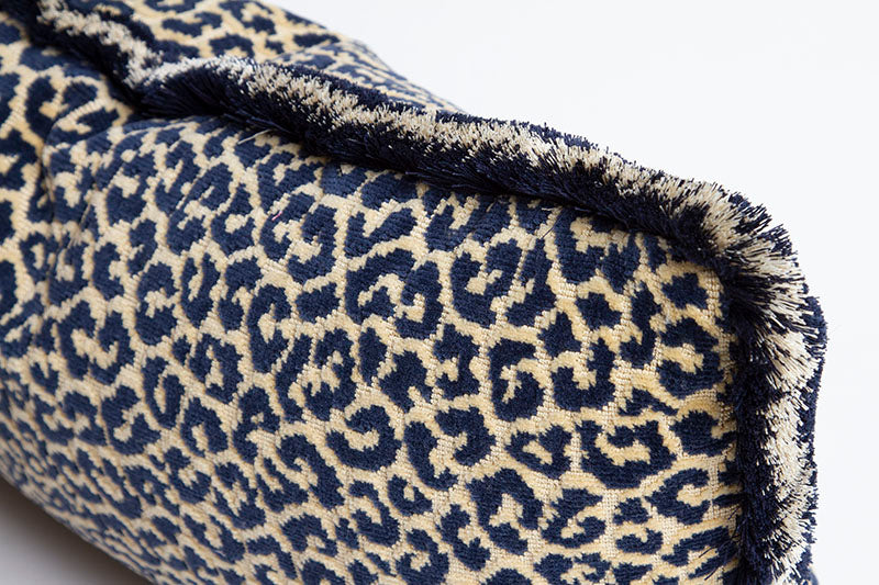 Midnight and light sand brush fringe detail on midnight blue and sand Scalamandre cut velvet animal print pillow