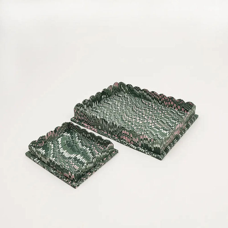 Handmade marbled scalloped trays in green, 100% cotton, measuring 12” x 9.5” x 2”. 