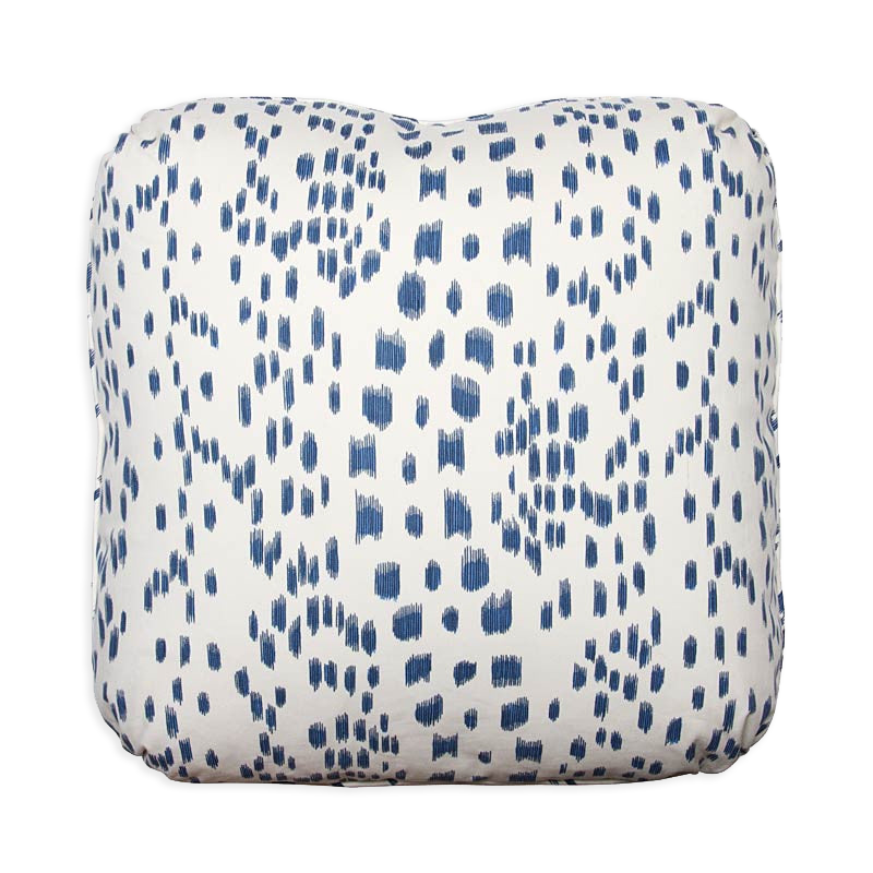 Les Touches abstract animal print pillow in deep indigo on white cotton with pleated corners.