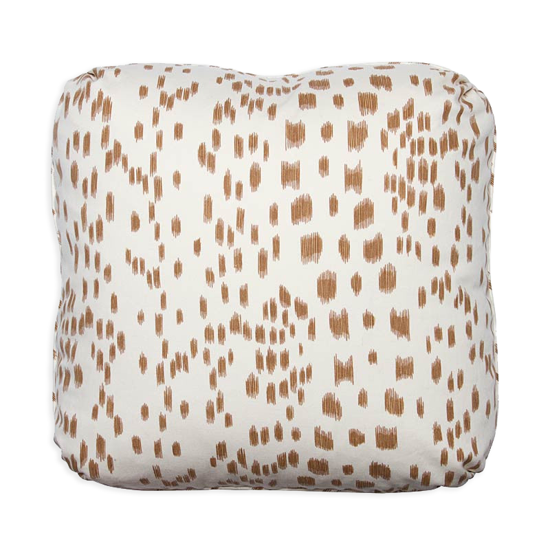 Les Touches abstract animal print pillow in tan on ivory cotton, with pleated corners.