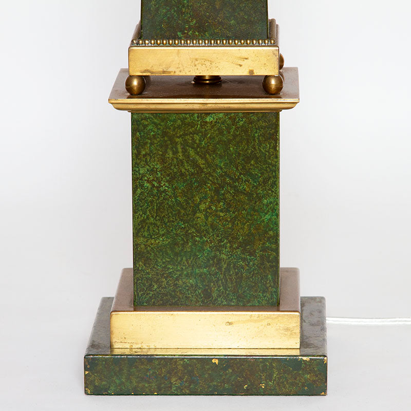 Base detail on vintage brass obelisk lamps with faux-marble painted sides, measuring 37” H x 6” W x 6” D.
