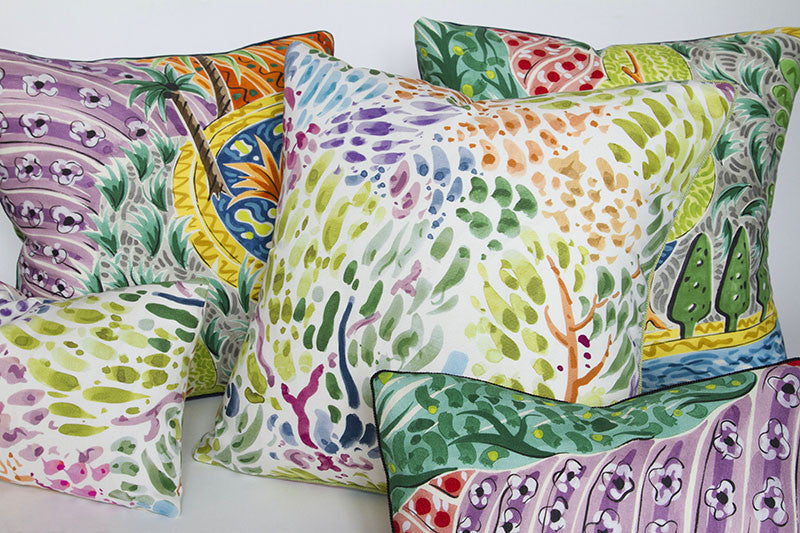 Clarence House Sole pillow with watercolor strokes and abstract trees on stain-resistant polyester, size 10 x 16 inches with other pillows.